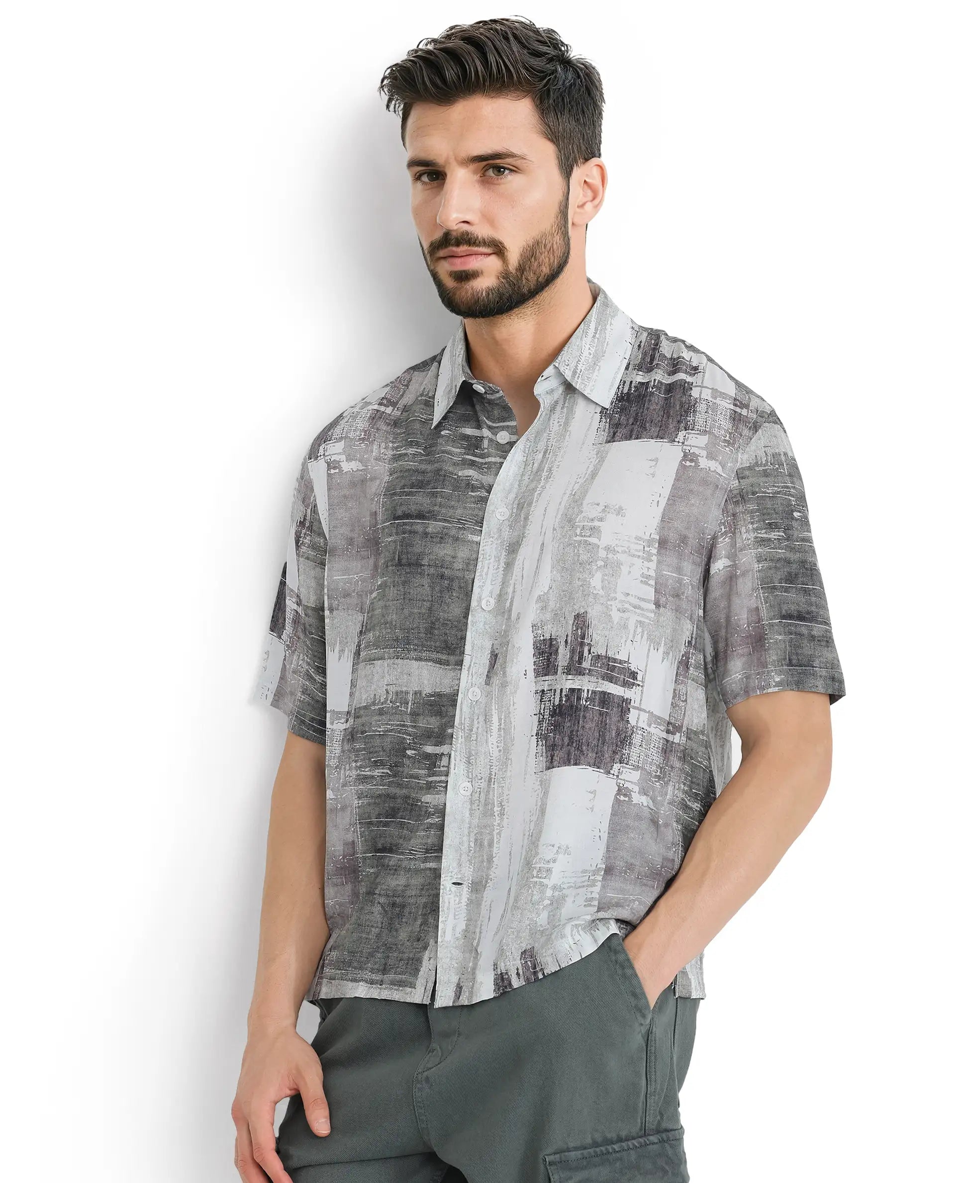 Men's Solid-Color Block Shirts for a Bold StatementRare Rabbit Men's Azah Dusky Green Viscose Fabric Short Sleeve Button Closure Abstract Printed Shirt Men's Solid-Color Block Shirts for a Bold StatementRare Rabbit Men's Azah Dusky Green Viscose Fabric Short Sleeve Button Closure Abstract Printed Shirt