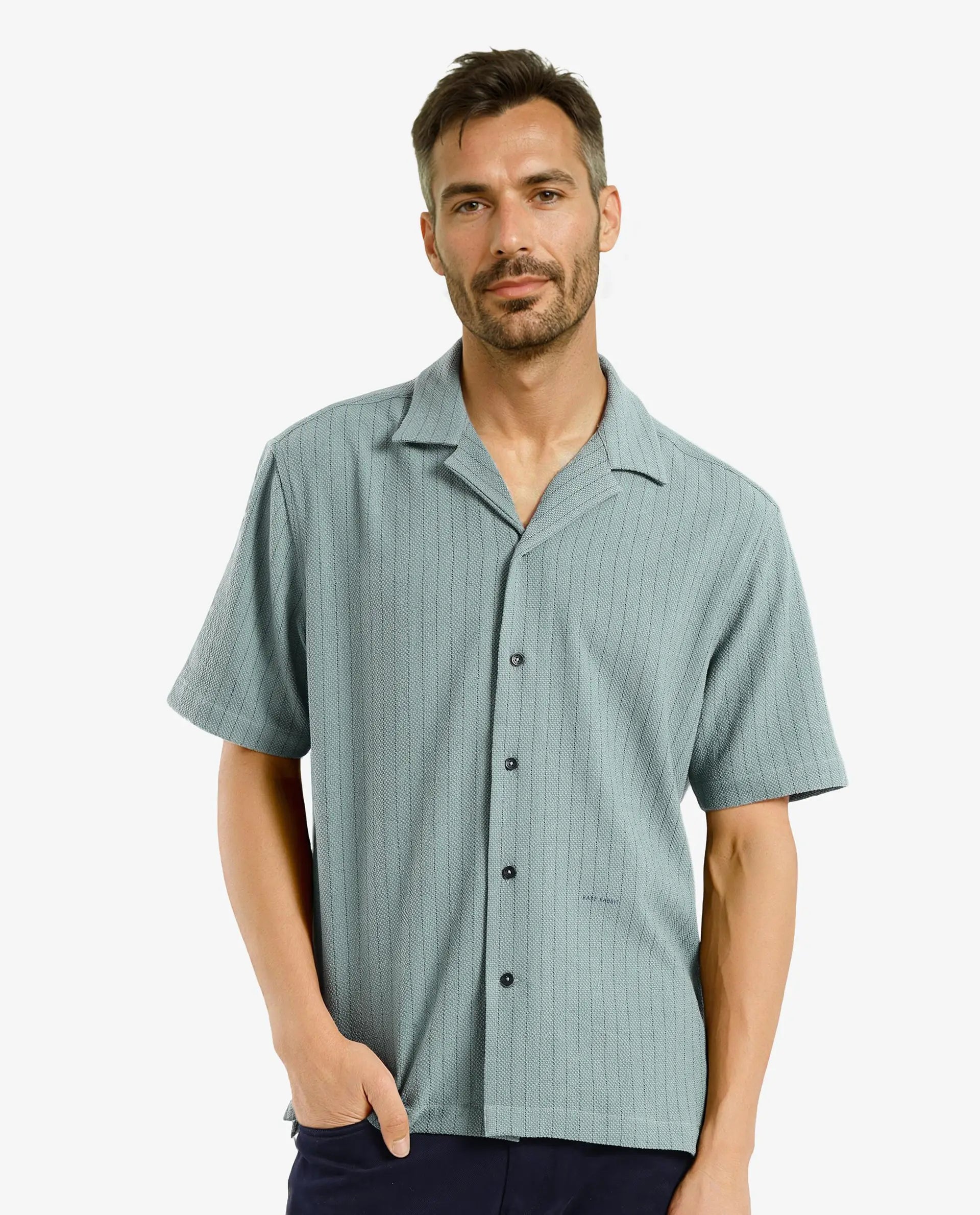 Men's Bold-Color Shirts for a Statement PieceRare Rabbit Men's Melon Dusky Green Poly Blend Fabric Half Sleeve Cuban Collared Boxy Fit Striped Shirt Men's Bold-Color Shirts for a Statement PieceRare Rabbit Men's Melon Dusky Green Poly Blend Fabric Half Sleeve Cuban Collared Boxy Fit Striped Shirt