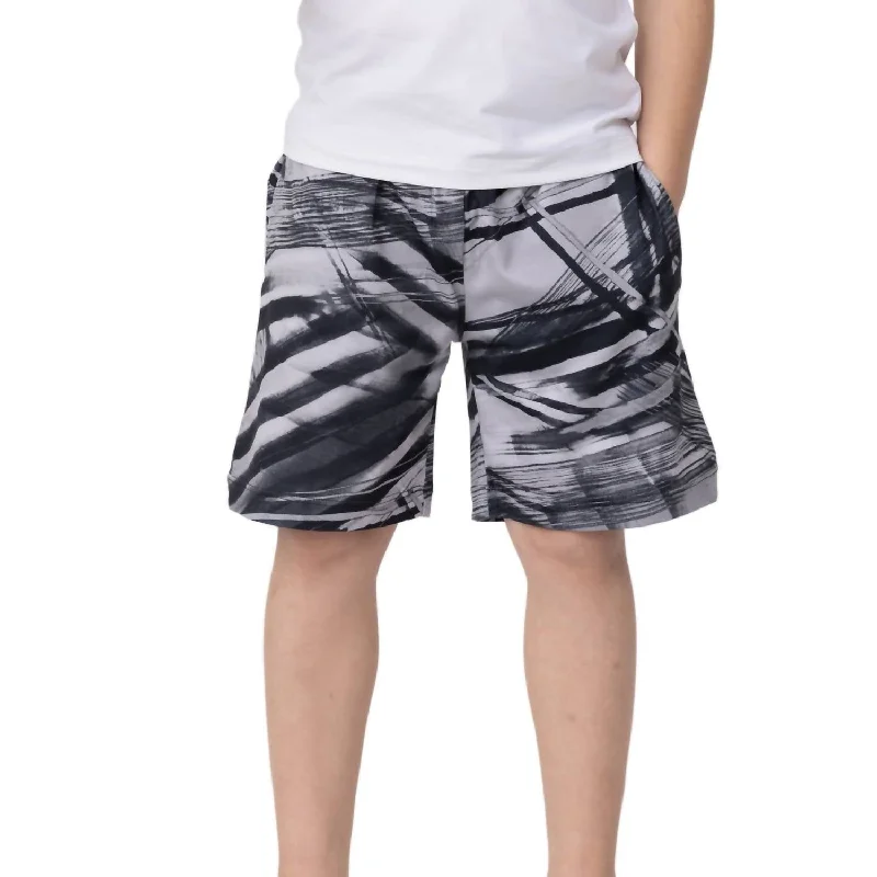 Men's Weather-Ready Travel ShortsBoy's Tennis Shorts In Action